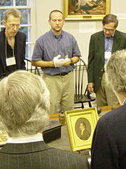 Curator Barry Rauhauser talks to a visiting group