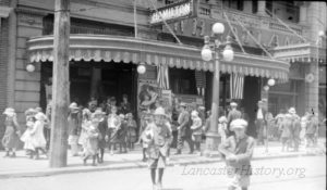 Children leaving the Hamilton Theater on North Queen Street.