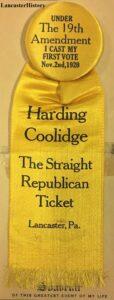 Yellow ribbon and pin supporting election of Harding and Coolidge in1920