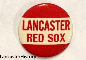 Red and white button with Lancaster Red Sox across center.