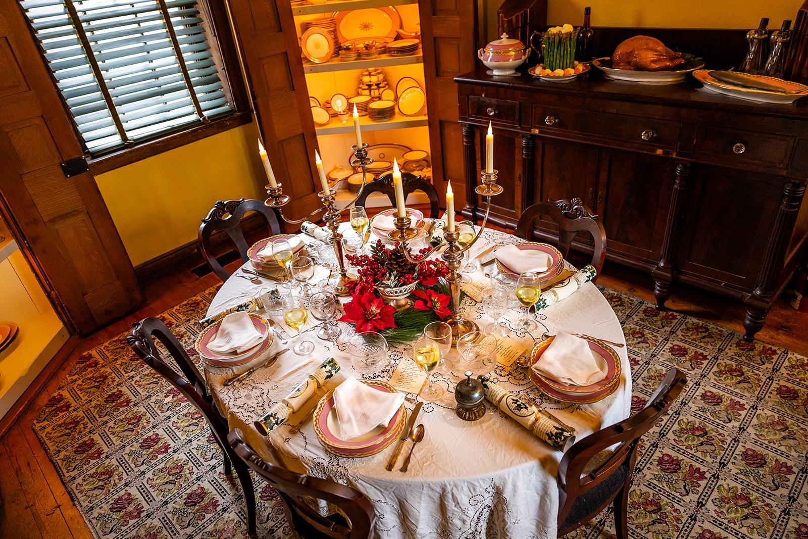 The dining room table set for a Christmas dinner in Wheatland's dining room.
