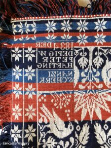 Coverlet showing reverse image of corner block