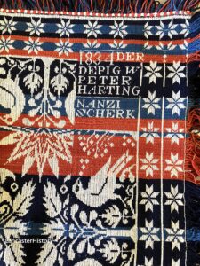 Coverlet showing image of corner block