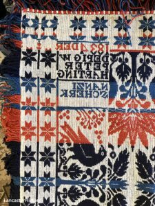 Coverlet showing reverse image of corner block