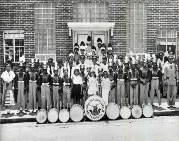 The Junior Herd of the Conestoga Elks Lodge poses for the camera in front of their lodge at 452 South Duke Street in Lancaster