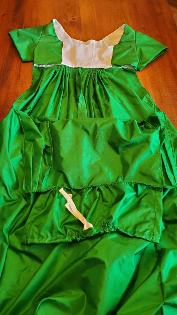 Gown with bib front dropped