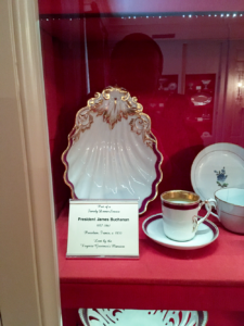 Closeup of three pieces of china on loan from LancasterHistory.