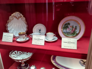 Shelf showing seven pieces of china owned and used by President James Buchanan.