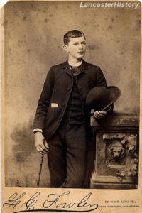 A cabinet card of FM Richmond. Richmond is posed in a black suit with a bowler-type hate and cane.