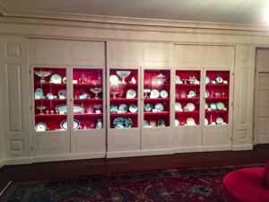 Built in wall case of china pieces consisting of six units, four shelves on each unit