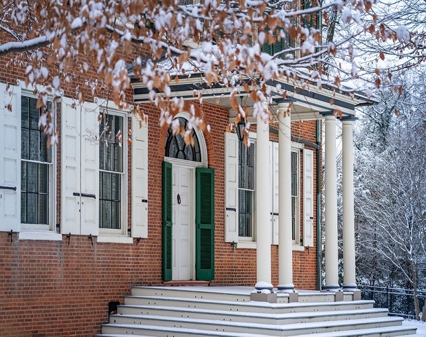 Photograph of Wheatland's front porch in winter