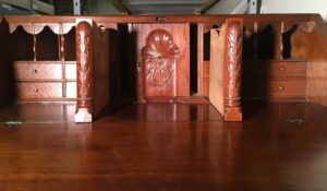 Desk interior showing removal of flanking quarter columns