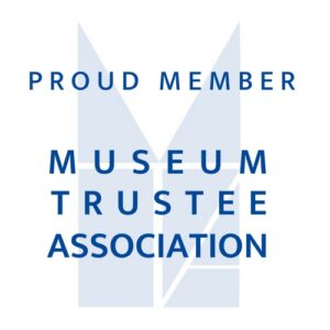 Logo with text: "Proud Member. Museum Trustee Association."