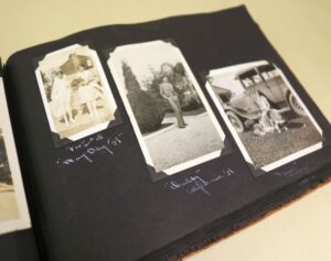 Snapshots taken in the 1920s mounted in an album of the Rich and Grove families