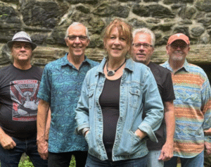 An image of the band members of Trouble with Annie. 