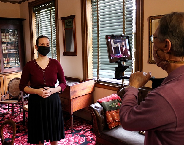 A person conducts a tour over Zoom.