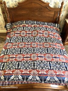 A coverlet on a bed